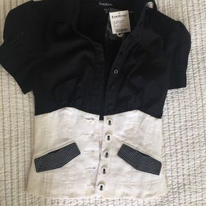 Cute Bebe corset style button up top.